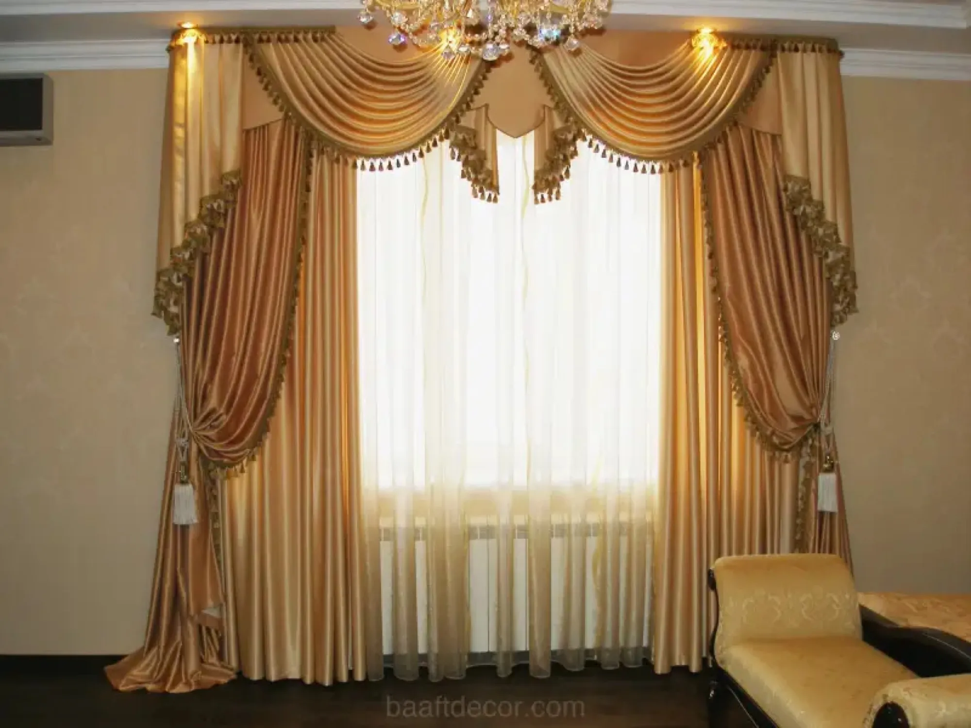 Gold swag curtains framing a window