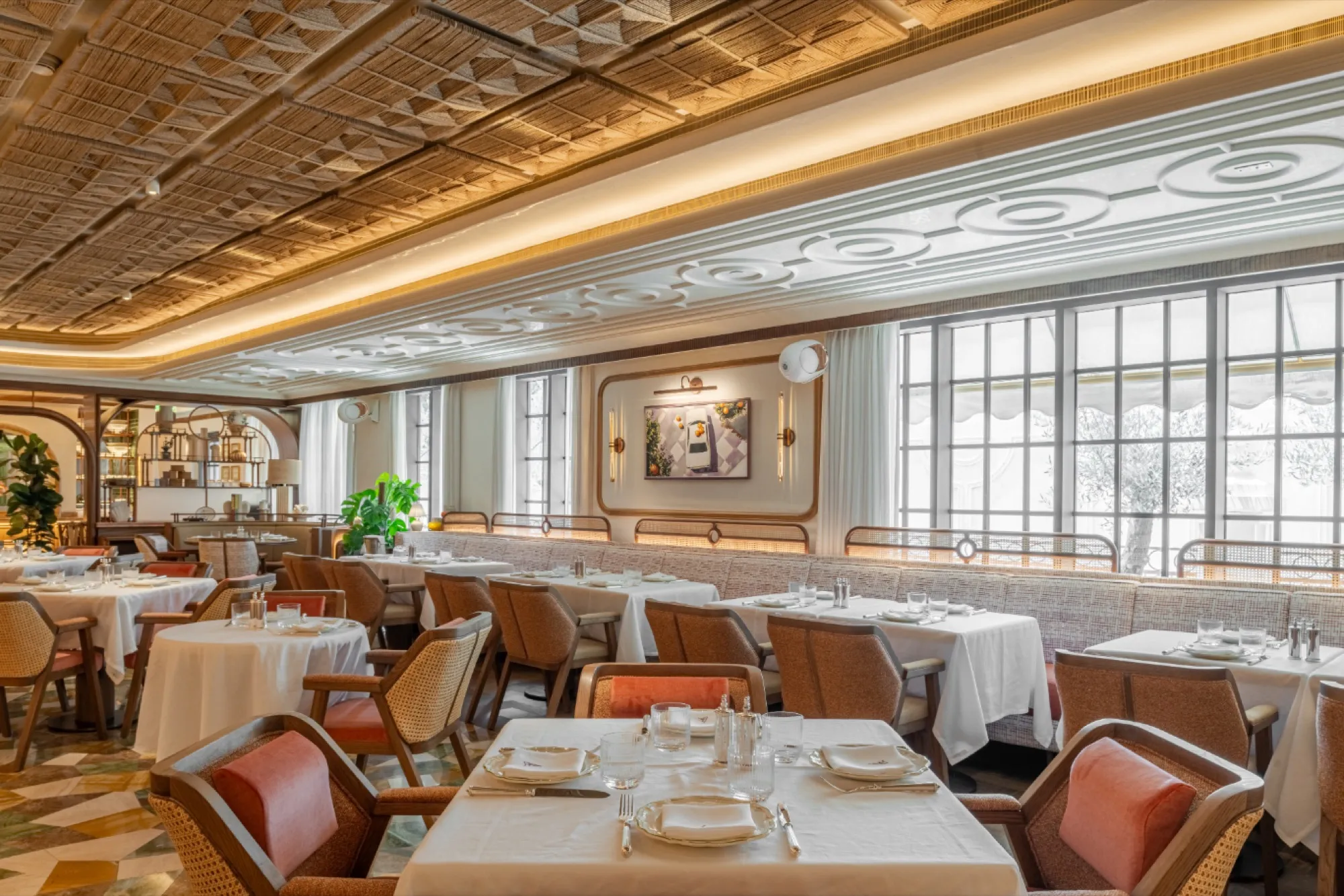 Long dining room with tall windows